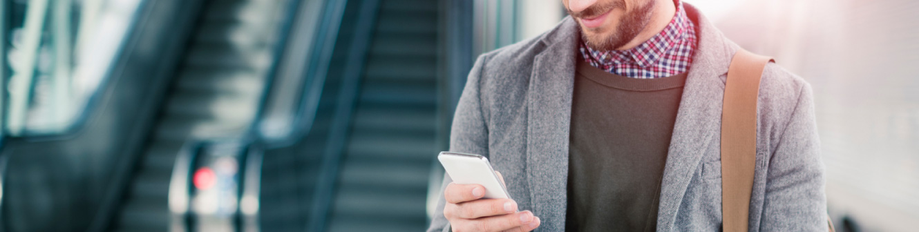 Man looking down at his phone